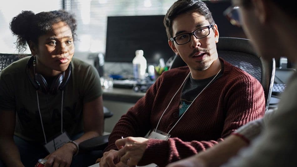 People discussing DevOps and SecOps